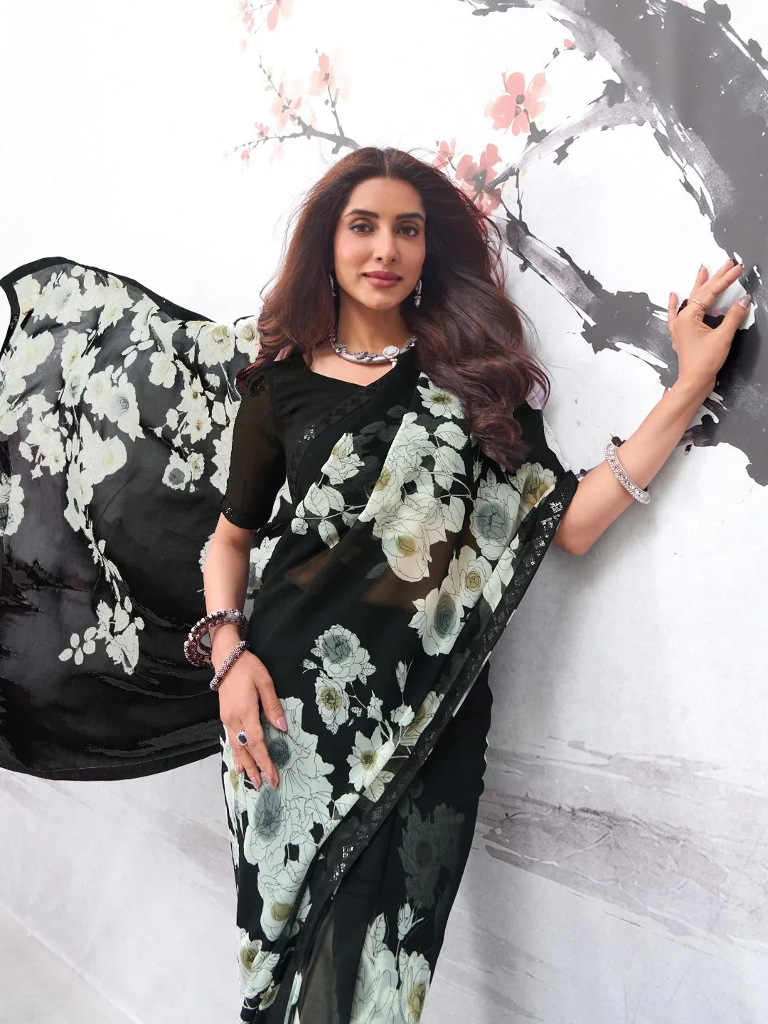 Laxmipati Hasinaa Black Georgette Floral Printed Saree