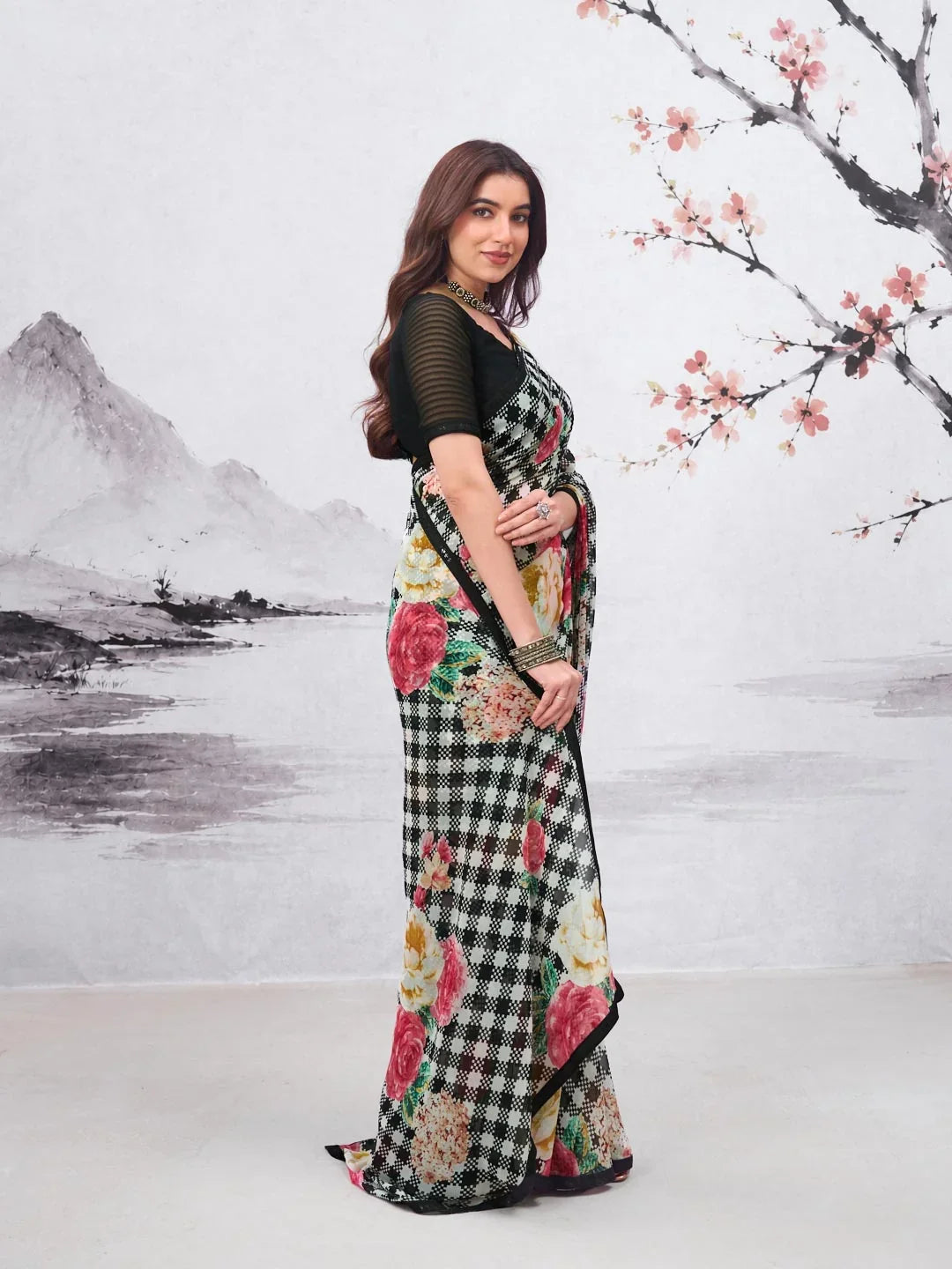 Laxmipati Hasinaa Black Georgette Floral Printed Saree